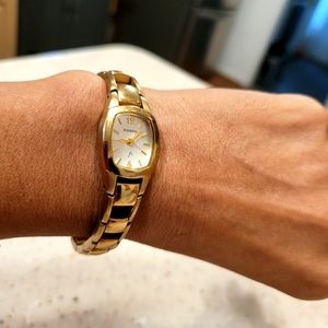 Fossil F2 women's gold tone watch.
